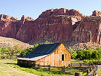 cabin near red rock cliffs
